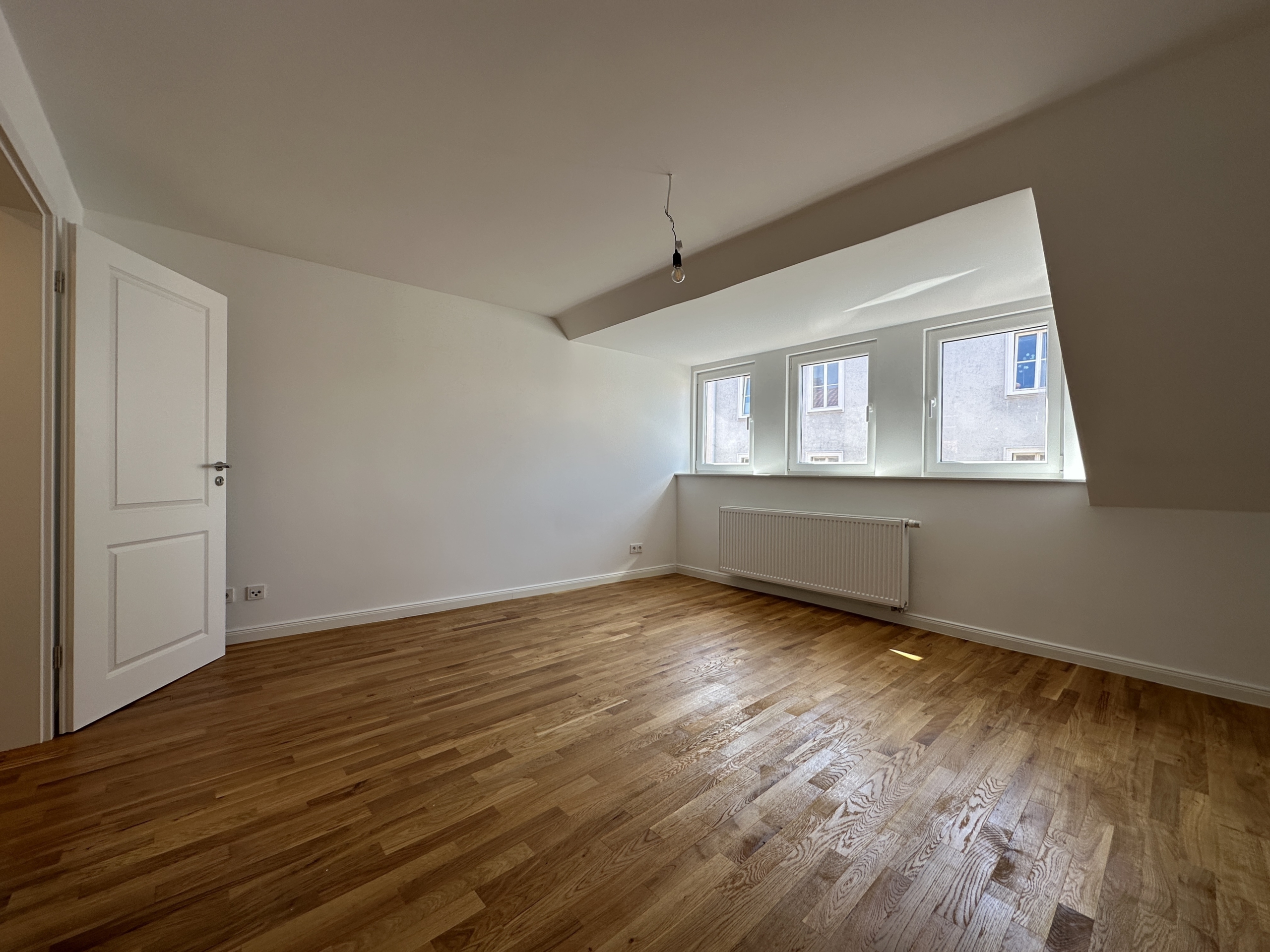 Wohnzimmer - Vollsanierte 2-Zimmerwohnung mit hochwertiger Einbauküche in Bestlage Hildesheim