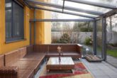 Familien aufgepasst - Architektur trifft auf höchsten Komfort mit Saunahaus und Whirlpool - Sommergarten mit Markise