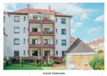 Erstbezug mit Einbauküche - 3 Zimmerwohnung mit Balkon und Gartenmitbenutzung - Aussenansicht Rückseite