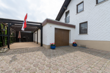 Carport und Garage - Wohnen mit Weitblick – Haus mit vielseitigen Nutzungsmöglichkeiten