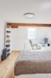 Toplage Südstadt - Sanierte 2.-Zimmerwohnung mit Einbauküche und Möblierung - Schlafzimmer_1
