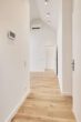 Besondere Ausstattung - Dachgeschosswohnung mit Fußbodenheizung und hohen Decken zum Erstbezug - 03_Eingangsbereich
