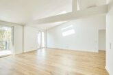 Besondere Ausstattung - Dachgeschosswohnung mit Fußbodenheizung und hohen Decken zum Erstbezug - Wohnzimmer