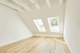 Besondere Ausstattung - Dachgeschosswohnung mit Fußbodenheizung und hohen Decken zum Erstbezug - Schlafzimmer