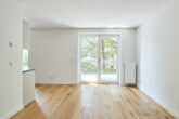 Traumhaftes 2-Zimmerapartment mit Balkon und Einbauküche in Bestlage Hannover - KFW Neubaustandard - Wohnzimmer